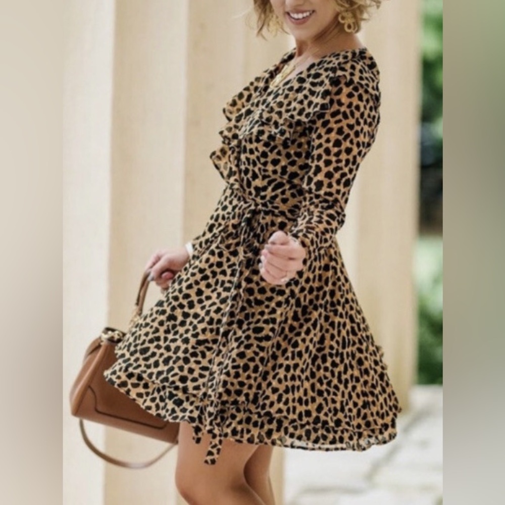 Free People Leopard Print Mini Dress with ruffles. Wrap around. Tan & black. M